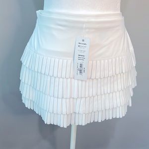 Lucky I Love solid white tennis skirt with pleats